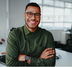 man with glasses and arms crossed